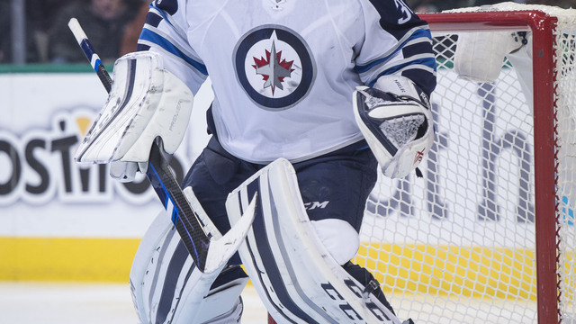 Pavelec out 'about a week' with lower-body injury