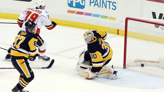 Watch: Flames' Ferland steals puck from Crosby, scores on breakaway