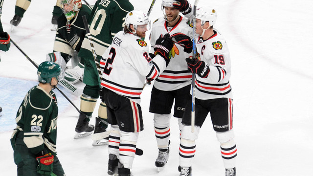 Toews caps off 3-point night with OT winner