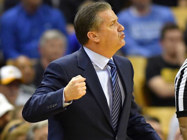 Watch: Calipari does Drive-By Dunk Challenge