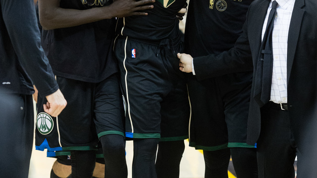 Bucks' Beasley suffers scary-looking knee injury