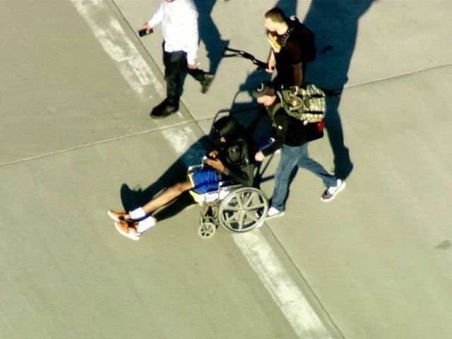 Durant returns to Oakland in wheelchair