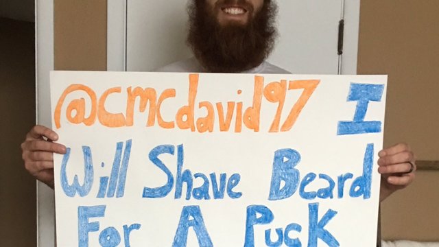 Fan keeps promise of shaving beard after getting puck from McDavid