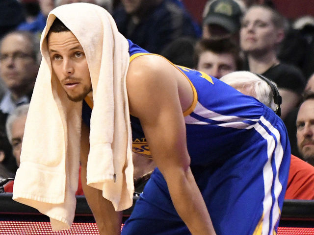 Watch: Curry rolls ankle on Fournier's foot
