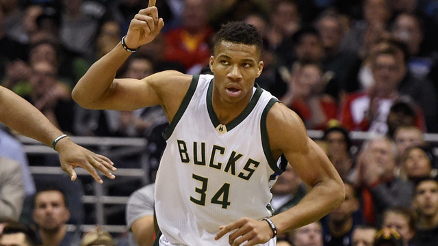 Watch: Antetokounmpo completes alley-oop while falling out of bounds