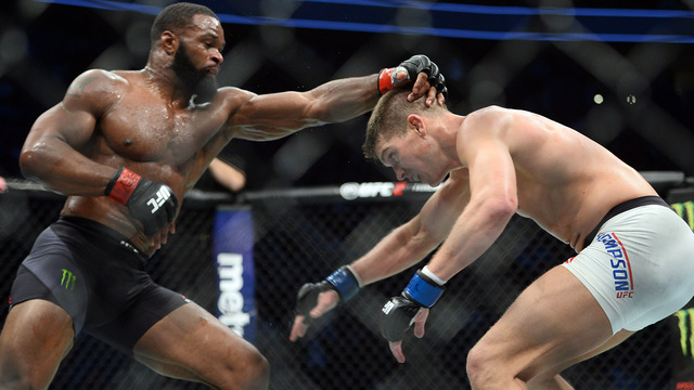 Woodley retains UFC welterweight title in 5-round snoozer vs. Thompson