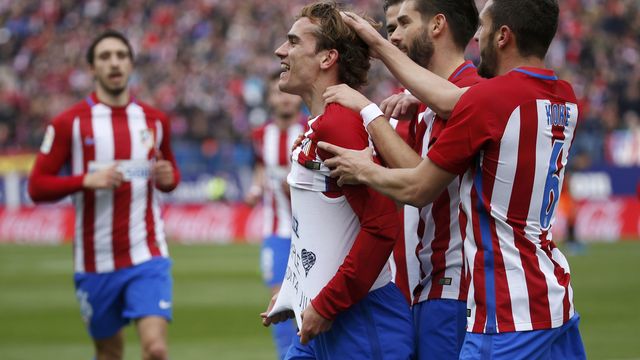 Torres looks on as Griezmann lifts Atletico to 4th place