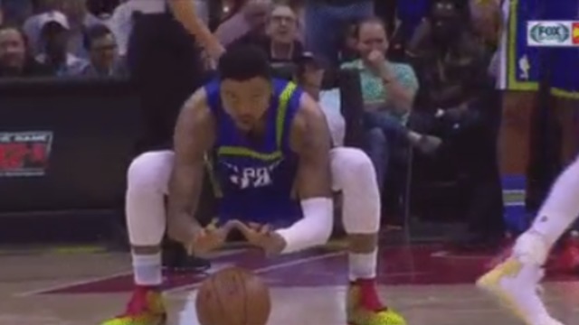 Hawks' Bazemore pretends ball is a campfire