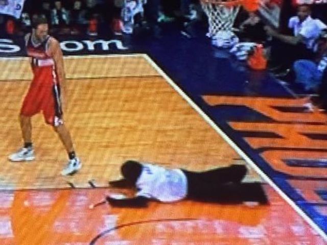 Watch: Suns mascot bizarrely dives into court while play continues