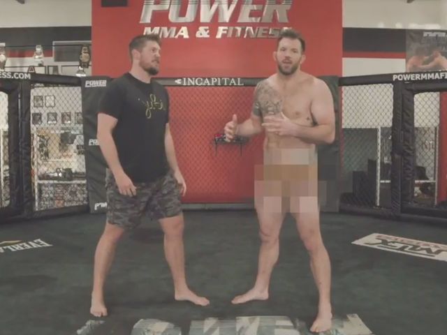 Bader demonstrates nude wrestling technique