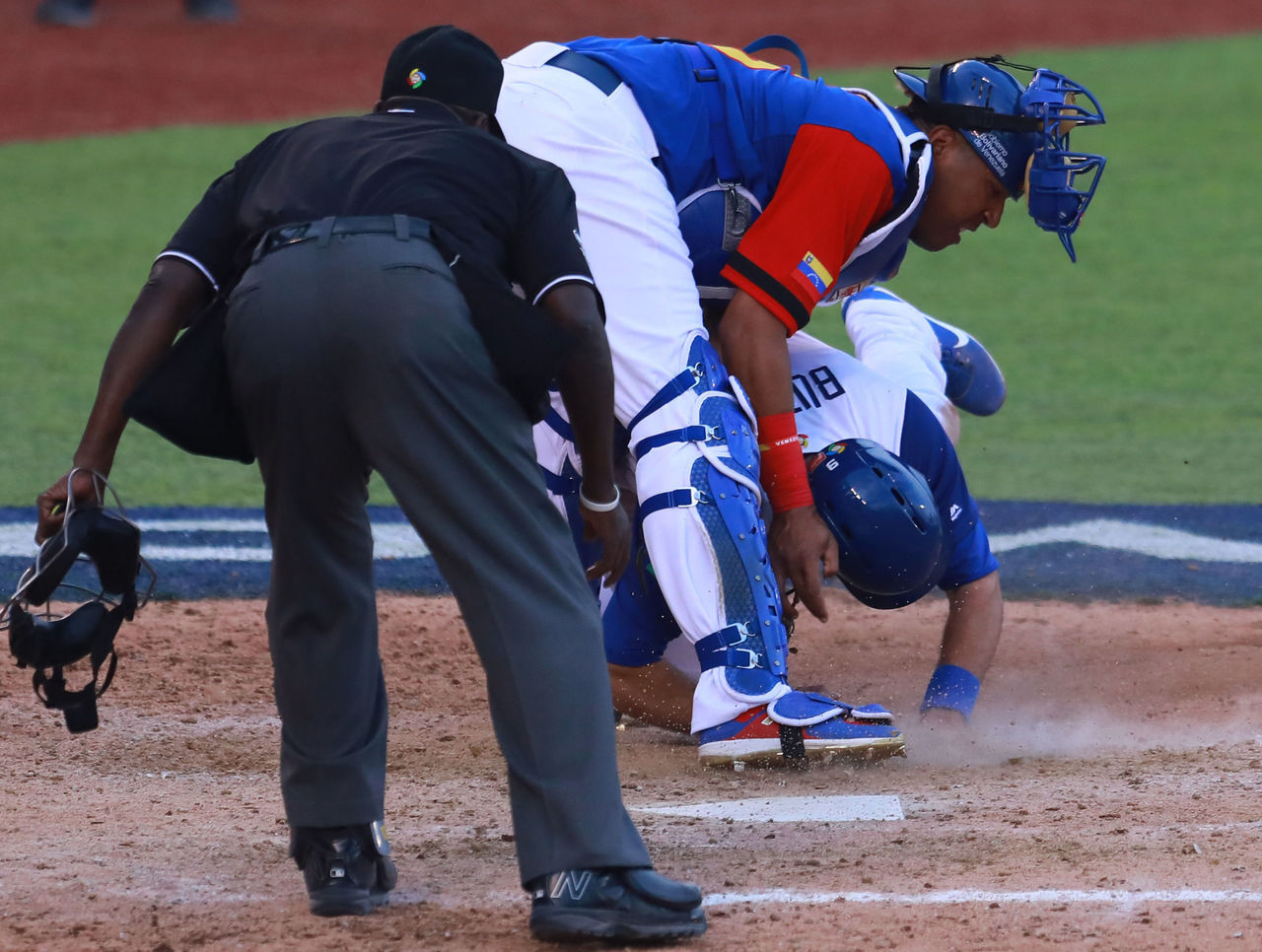 Venezuela's Salvador Perez injured by Royals backup Drew Butera during WBC  win