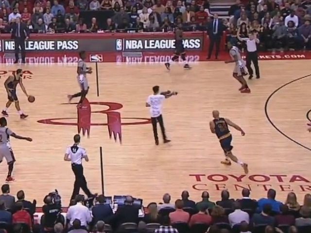 Fan enters court during Rockets-Cavs game, briefly eludes security
