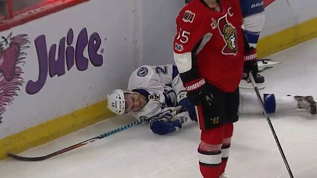Lightning's Point crashes into boards after netting rebound goal