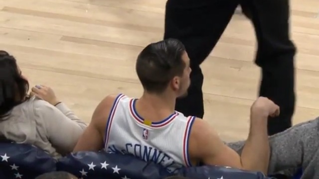 76ers' McConnell saves ball, takes courtside seat