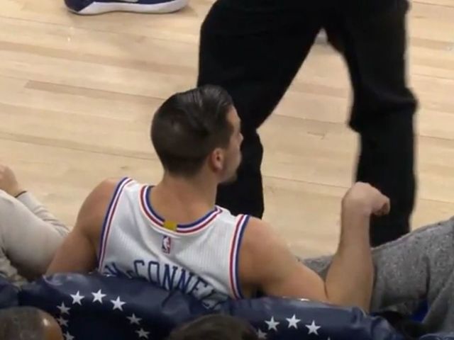 76ers' McConnell saves ball, takes courtside seat