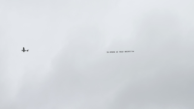 Look: Duelling Wenger banners mar West Brom visit