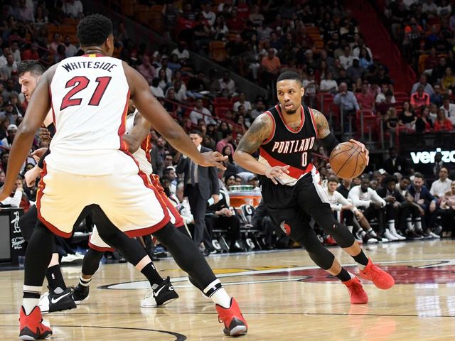 Whiteside, Lillard named Players of the Week