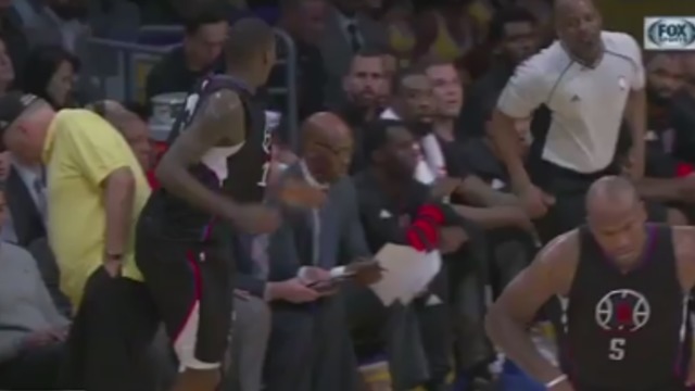 Clippers' Crawford topples over fan standing courtside