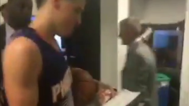 Watch: Booker gets game ball, views stat sheet after 70-point outburst