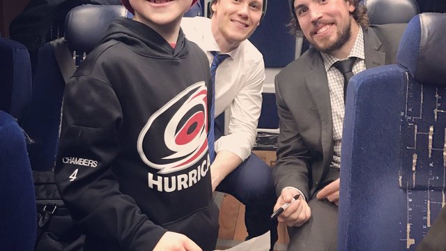 Hurricanes invite young fan onto team bus after win