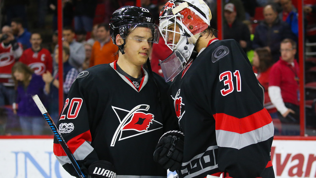 Hurricanes' Lack stretchered off after collision with Athanasiou