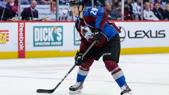 Watch: MacKinnon splits Caps D-men, nets beauty backhand