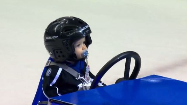 Baby rides fake Zamboni at intermission