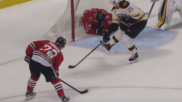 Blackhawks' Panik records assist from inside Bruins' net