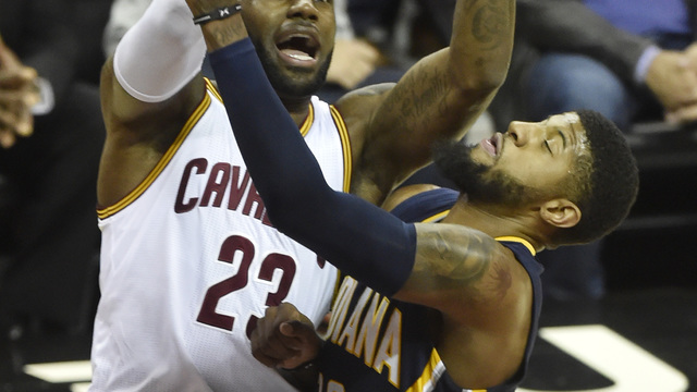 Watch: LeBron destroys Paul George at the rim