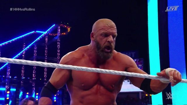 Triple H accidentally knocks Stephanie through table at WrestleMania