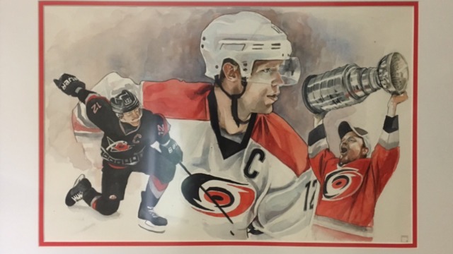 Jordan Staal presents brother Eric with painting to commemorate 1,000th game