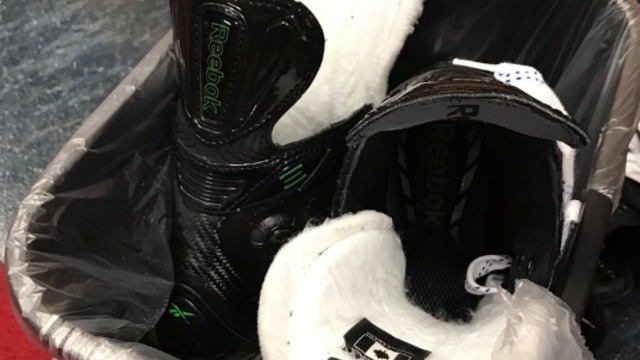 Shawn Thornton throws skates in trash after final NHL game