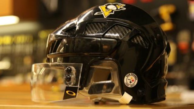 Penguins honor Dan Rooney with helmet decals in Game 2