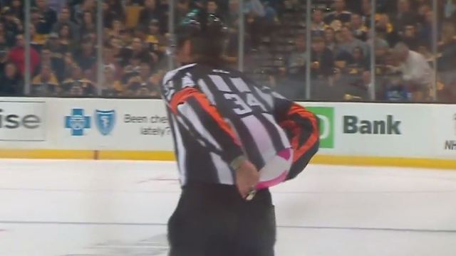 Watch: Beach ball hits ice in Boston, ref tucks it in shirt