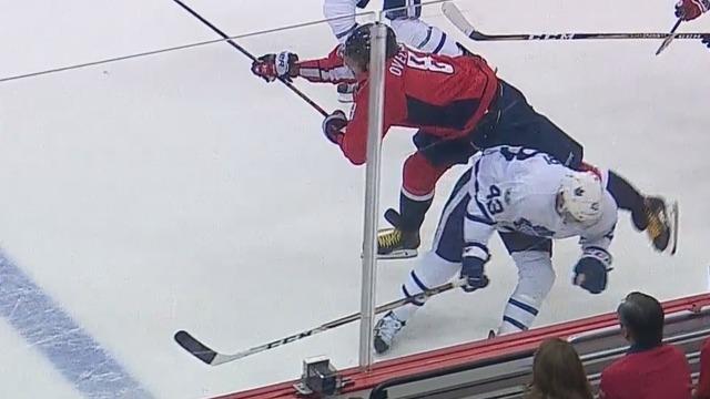 Watch: Ovechkin forced from game momentarily after Kadri hip check