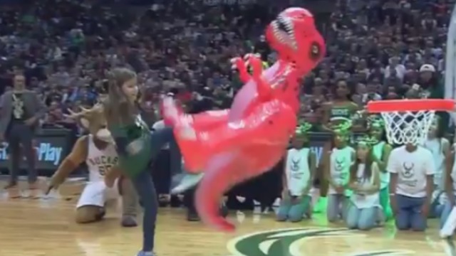 Watch: Bucks fan kicks inflatable Raptor during kids dunk contest