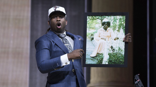 Falcons' McKinley blasts Clay Travis for mocking photo of grandmother