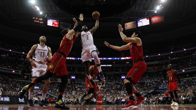 Watch: John Wall keeps dunking all over the Hawks