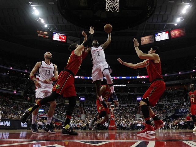 Watch: John Wall keeps dunking all over the Hawks