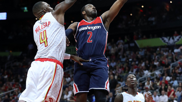 Wizards eliminate Hawks behind Wall's playoff career-high 42 points