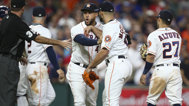 Watch: Rangers, Astros clear benches after McCullers throws behind Napoli