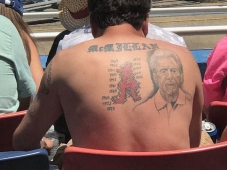 Alabama fan sports large Nick Saban portrait tattooed on his back