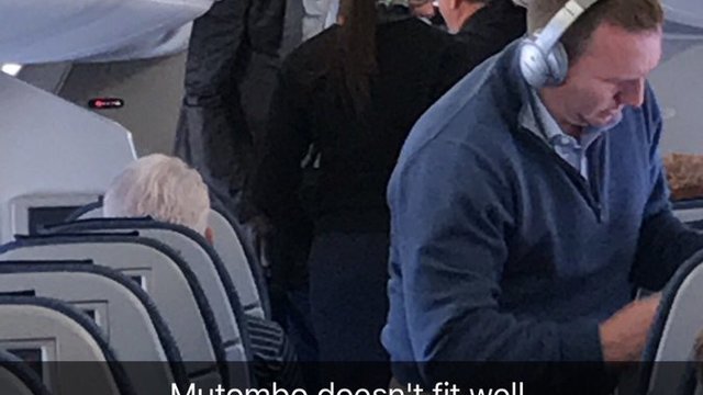Dikembe Mutombo boards tiny plane