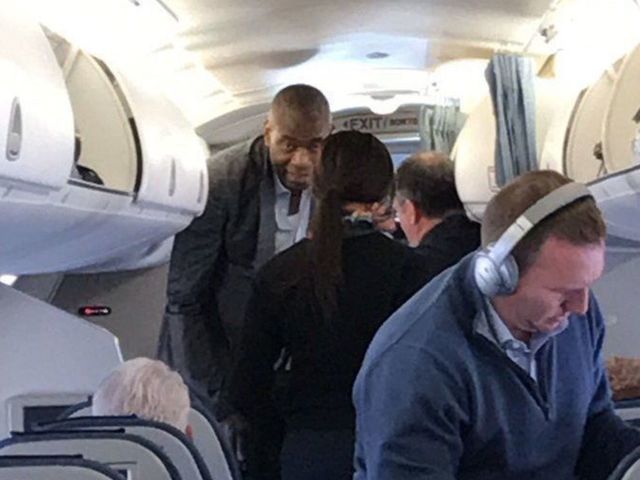 Dikembe Mutombo boards tiny plane