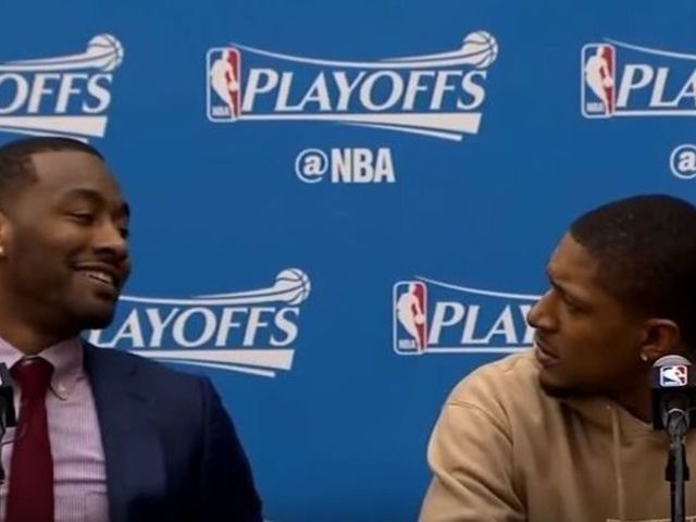 Watch: Beal dumbfounded after learning of Wall's jump onto scorer's table