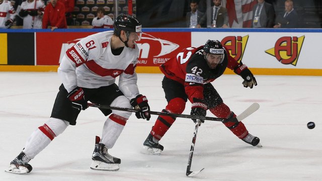 Watch: Leafs prospect Herzog roofs backhand as Swiss shock Canada in OT