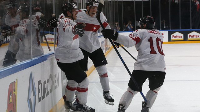 World Championship: Swiss stun Canada in OT, U.S. holds off Latvia