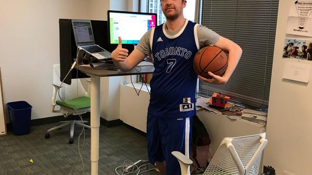 Knicks fan loses bet, goes to work in custom Bargnani jersey