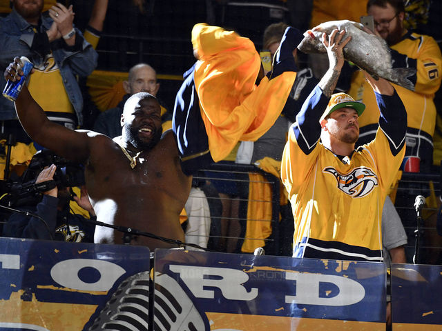 Watch: Mariota, Titans O-line chug beers, fire up crowd at Preds game