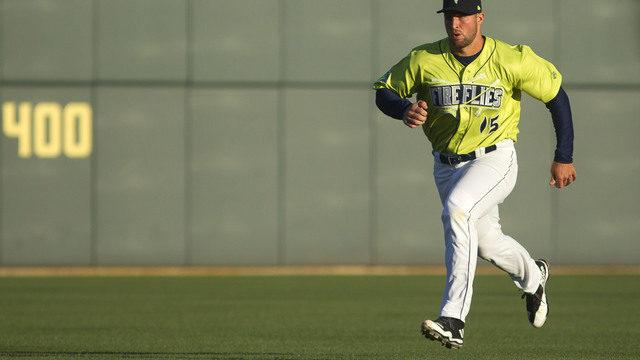 Tebow's airmailed warmup throw hit a fan in the family jewels